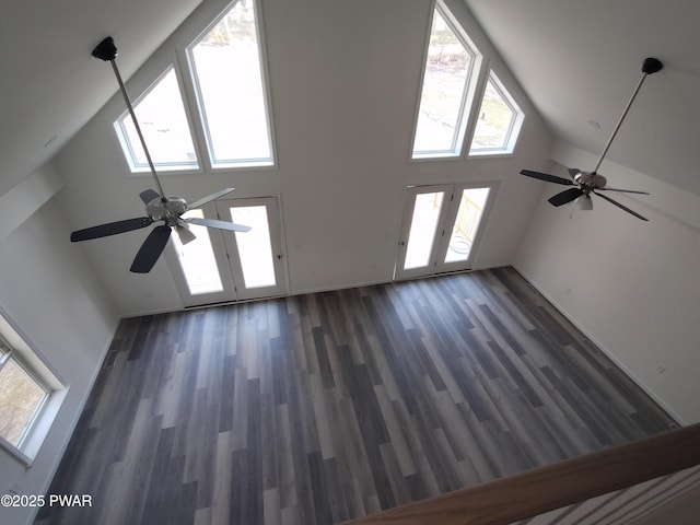 4409 Middleton Dr, Milford, PA 18337 - unfurnished living room featuring high vaulted ceiling, a ceiling fan, wood finished floors, healthy amount of natural light, and french doors