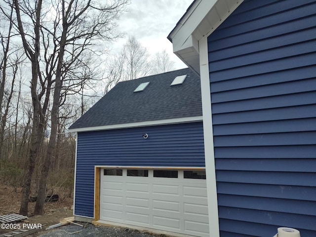 4409 Middleton Dr, Milford, PA 18337 - view of property exterior with a shingled roof and a garage