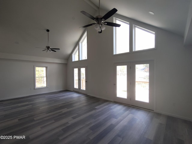 4409 Middleton Dr, Milford, PA 18337 - unfurnished living room with a ceiling fan, high vaulted ceiling, dark wood finished floors, baseboards, and french doors