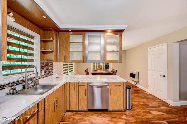 kitchen featuring kitchen peninsula, stainless steel dishwasher, heating unit, sink, and hardwood / wood-style flooring