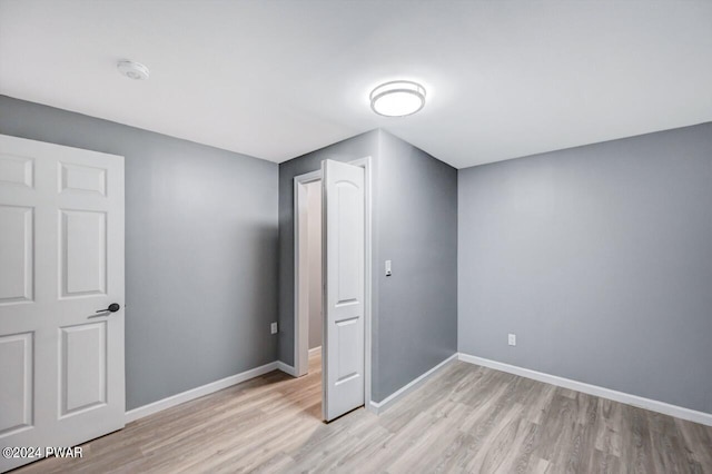 unfurnished bedroom featuring light hardwood / wood-style flooring