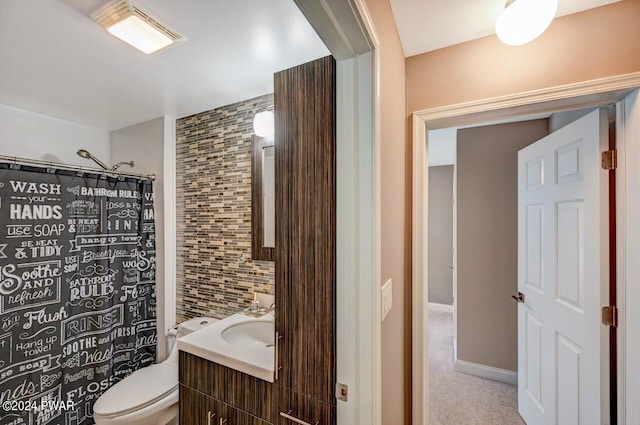 full bathroom featuring vanity, toilet, and shower / bathtub combination with curtain