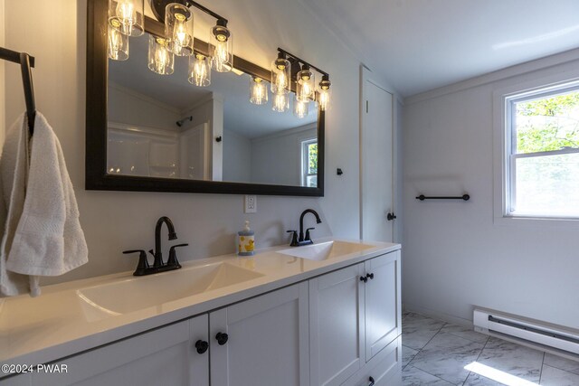 23 S Fairway Dr, Lake Ariel, PA 18436 - full bathroom featuring a baseboard radiator, marble look tiles, double vanity, and crown molding