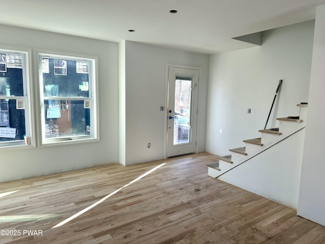 foyer with light hardwood / wood-style flooring