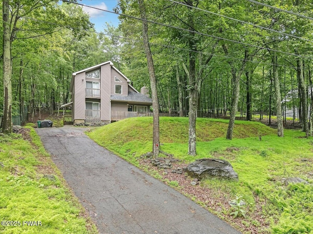 102 Keystone Ct, Dingmans Ferry, PA 18328 - view of front facade with asphalt driveway and a view of trees