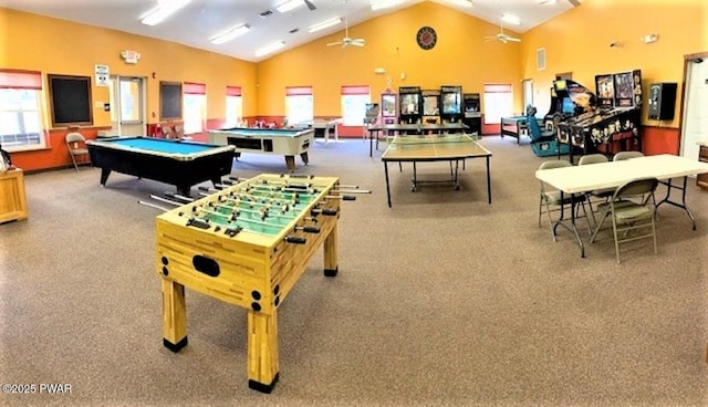 recreation room featuring carpet flooring, plenty of natural light, ceiling fan, billiards table, and high vaulted ceiling