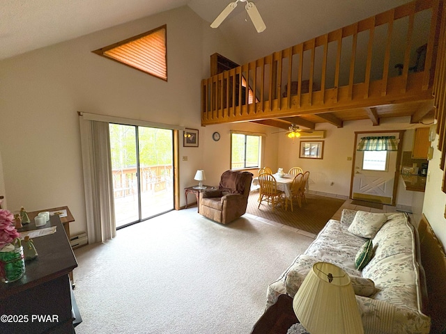 living area with ceiling fan, carpet floors, a baseboard radiator, and lofted ceiling