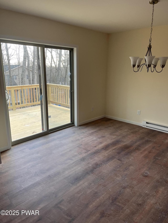 unfurnished dining area with hardwood / wood-style flooring, a notable chandelier, and a wealth of natural light