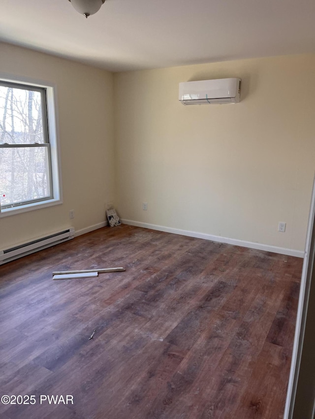 empty room with a baseboard radiator, a wall mounted AC, and dark wood-type flooring