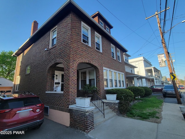 1237 S Main St, Old Forge, PA 18518 - traditional style home featuring a chimney and brick siding