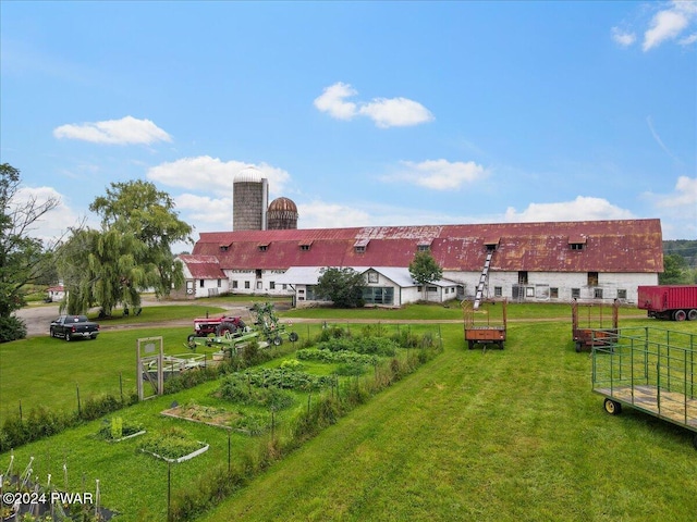 view of home's community featuring a yard