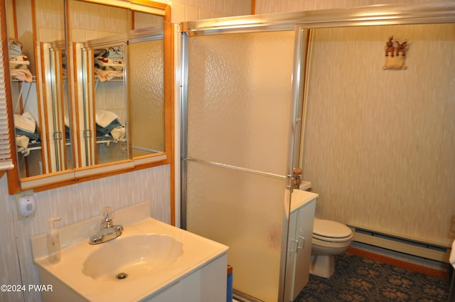 full bath featuring a baseboard radiator, an enclosed shower, and vanity