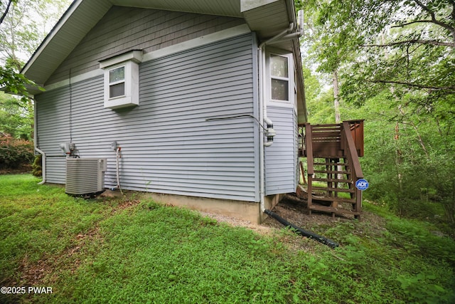 3122 Sparrow Ct, East Stroudsburg, PA 18302 - view of side of property with a central AC unit and a lawn