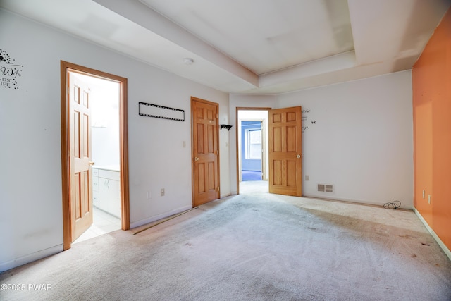 3122 Sparrow Ct, East Stroudsburg, PA 18302 - unfurnished bedroom featuring a raised ceiling, carpet floors, and ensuite bath