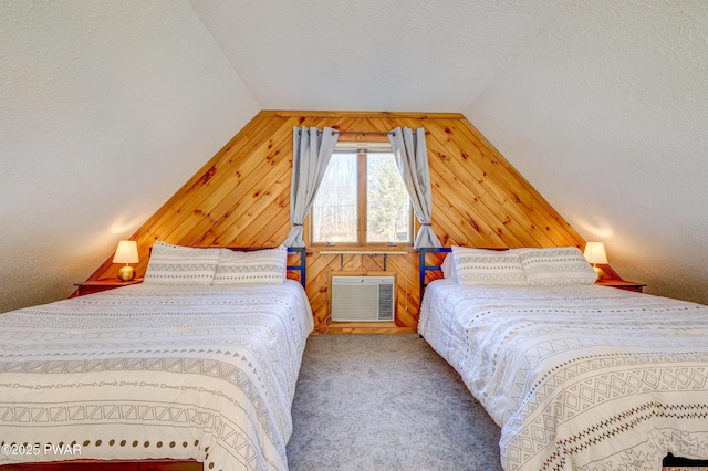 carpeted bedroom with lofted ceiling, a wall mounted air conditioner, and wood walls