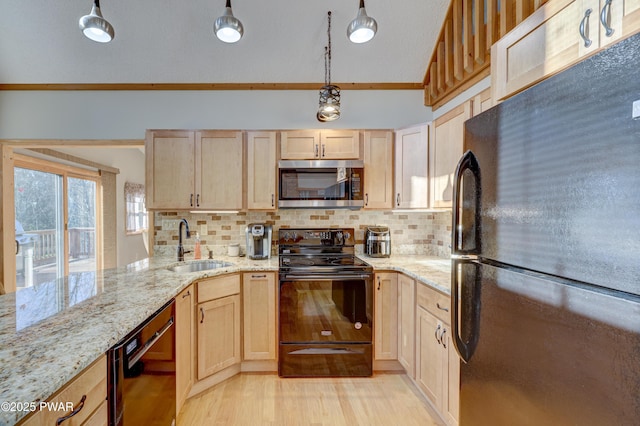 kitchen featuring tasteful backsplash, sink, light brown cabinetry, and black appliances