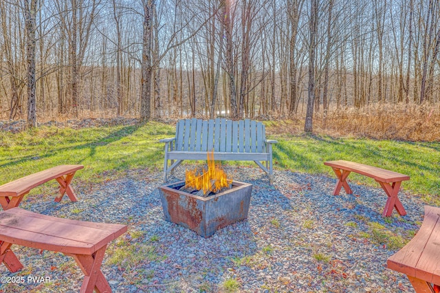 view of patio / terrace with an outdoor fire pit