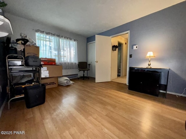 235 Falling Waters Blvd, Lackawaxen, PA 18435 - office space featuring wood finished floors and a baseboard radiator