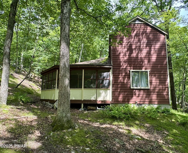 235 Falling Waters Blvd, Lackawaxen, PA 18435 - view of side of home featuring a sunroom