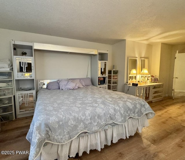 235 Falling Waters Blvd, Lackawaxen, PA 18435 - bedroom with a textured ceiling and wood finished floors