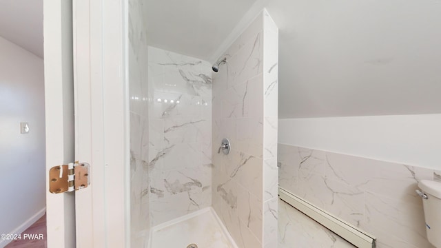 bathroom featuring wood-type flooring and tiled shower