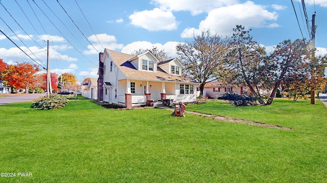 view of front of property featuring a porch and a front lawn