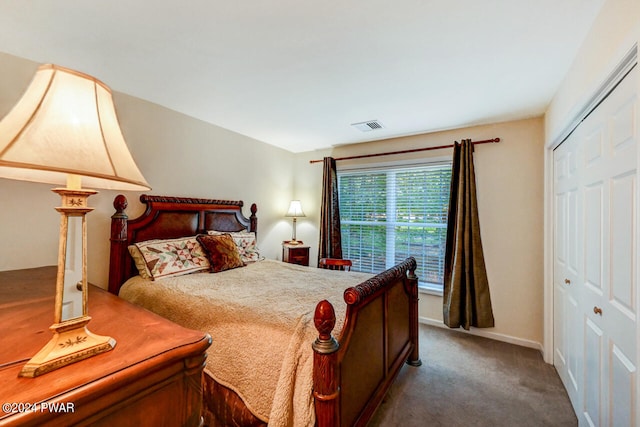 bedroom with carpet flooring and a closet