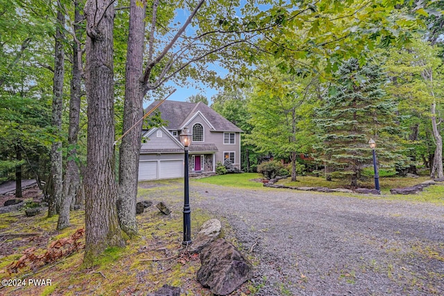 view of front of property with a garage