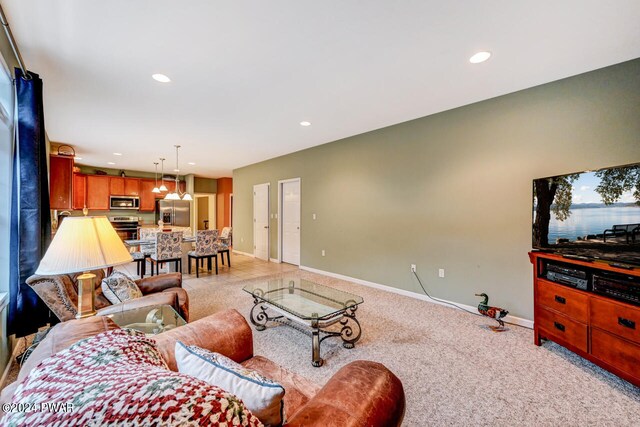 living room featuring light carpet