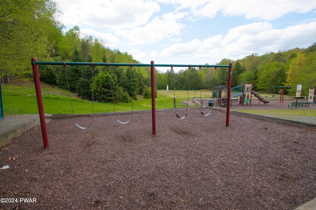 view of play area with a yard