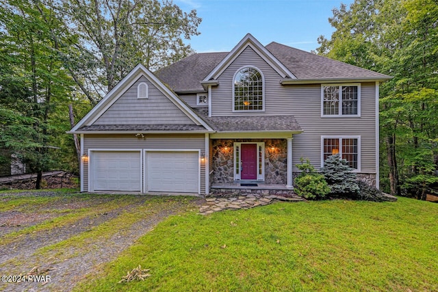 view of front facade with a front lawn and a garage