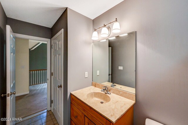 bathroom with vanity and tile patterned floors