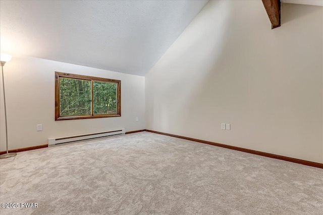 1180 Wallenpaupack Dr, Lake Ariel, PA 18436 - carpeted spare room featuring a baseboard radiator, vaulted ceiling, and a textured ceiling