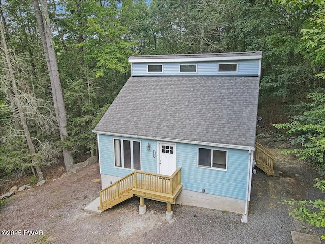 1180 Wallenpaupack Dr, Lake Ariel, PA 18436 - view of front of property with roof with shingles and view of wooded area