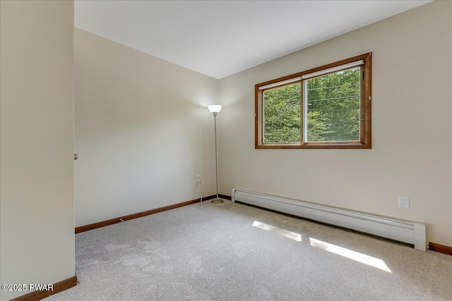 1180 Wallenpaupack Dr, Lake Ariel, PA 18436 - carpeted spare room featuring a baseboard radiator and baseboards