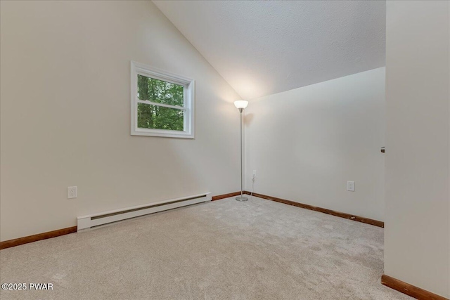 1180 Wallenpaupack Dr, Lake Ariel, PA 18436 - carpeted empty room featuring baseboard heating and vaulted ceiling