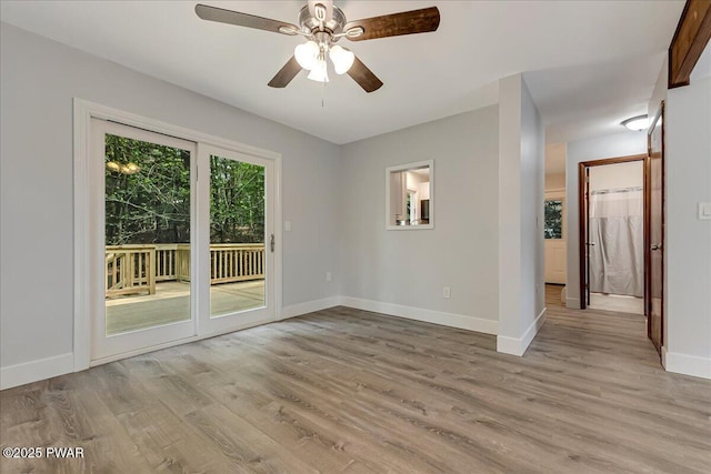 1180 Wallenpaupack Dr, Lake Ariel, PA 18436 - empty room with light wood-style floors and a ceiling fan