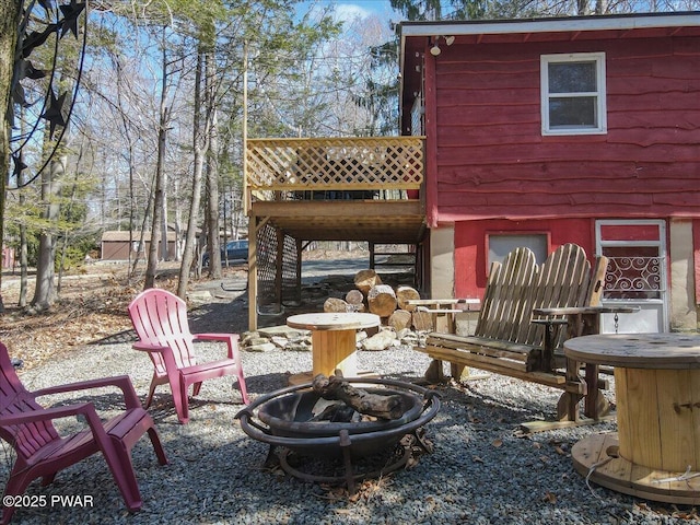 91 Bruin Rd, Lake Ariel, PA 18436 - view of yard with an outdoor fire pit, a wooden deck, and stairway