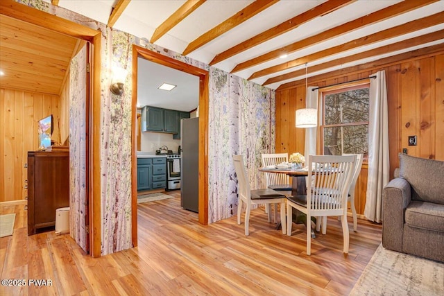 91 Bruin Rd, Lake Ariel, PA 18436 - dining area featuring light wood-style flooring and wood walls