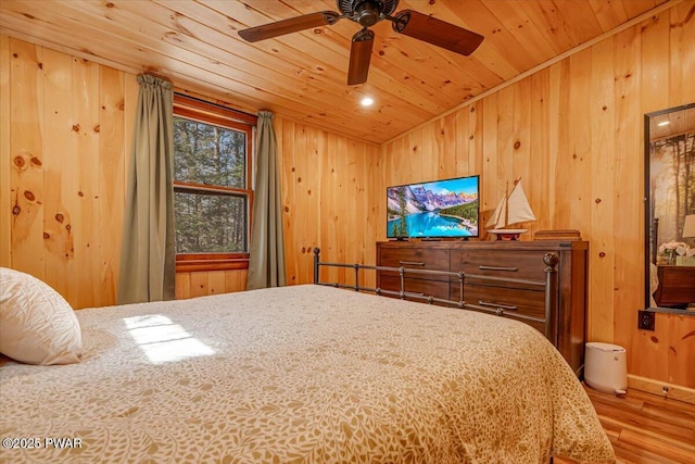 91 Bruin Rd, Lake Ariel, PA 18436 - bedroom with wood finished floors, wooden ceiling, wooden walls, and ceiling fan
