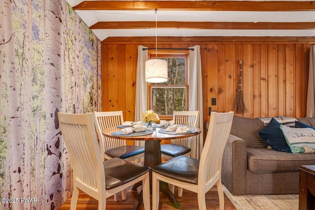 91 Bruin Rd, Lake Ariel, PA 18436 - dining area featuring wooden walls, beam ceiling, and wood finished floors