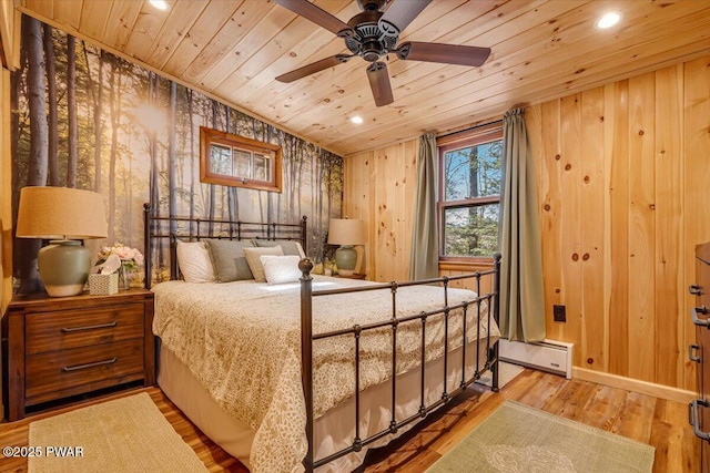 91 Bruin Rd, Lake Ariel, PA 18436 - bedroom featuring wooden ceiling, baseboard heating, wood finished floors, recessed lighting, and baseboards