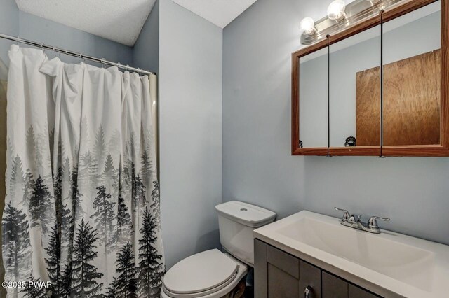 24 Lakewood Dr, Lake Ariel, PA 18436 - full bath with vanity, toilet, and a shower with curtain
