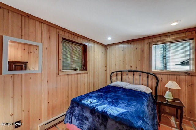 24 Lakewood Dr, Lake Ariel, PA 18436 - bedroom featuring a baseboard heating unit, wood walls, and recessed lighting