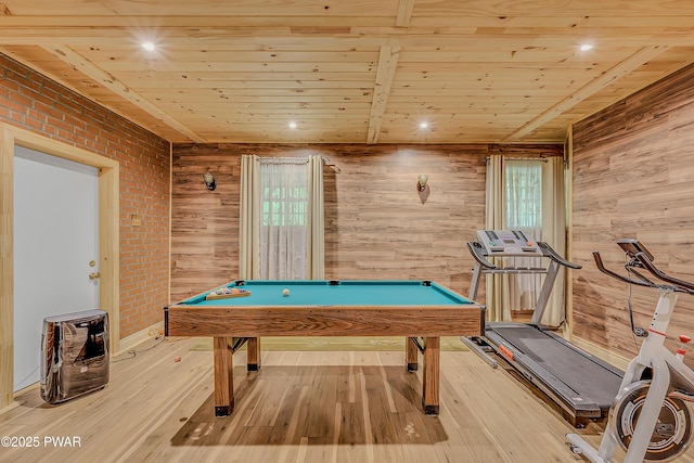 2106 Blueberry Ct, Bushkill, PA 18324 - playroom with wooden walls, wooden ceiling, billiards table, hardwood / wood-style floors, and brick wall