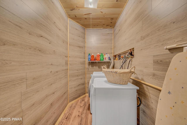 2106 Blueberry Ct, Bushkill, PA 18324 - laundry room featuring wood walls, washing machine and clothes dryer, light wood-style flooring, and wooden ceiling