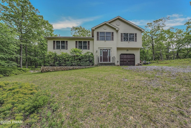 2106 Blueberry Ct, Bushkill, PA 18324 - tri-level home with an attached garage and a front lawn