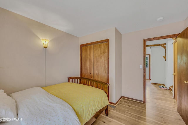 2106 Blueberry Ct, Bushkill, PA 18324 - bedroom with light wood-style flooring and baseboards