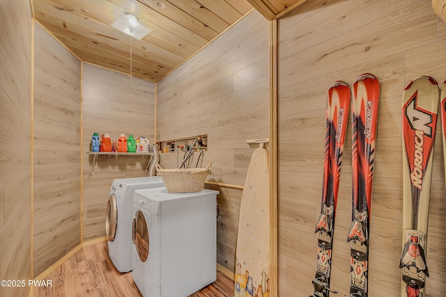 2106 Blueberry Ct, Bushkill, PA 18324 - laundry room with separate washer and dryer, wooden walls, wood finished floors, and wooden ceiling