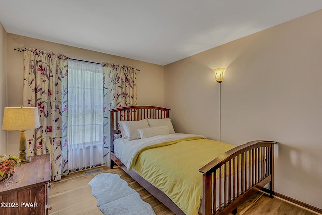 2106 Blueberry Ct, Bushkill, PA 18324 - bedroom with wood finished floors and baseboards